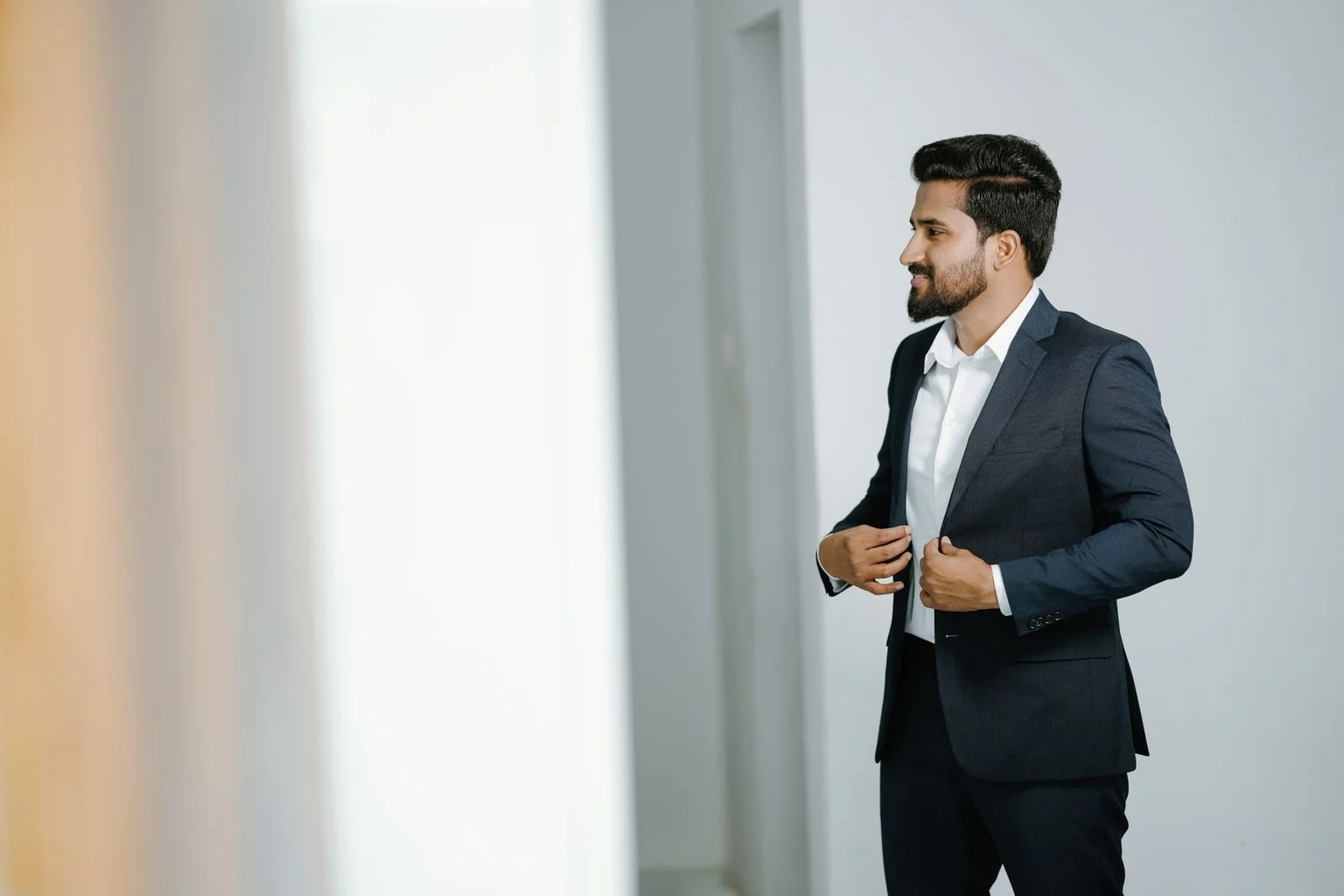 Indian executive in a tailored suit